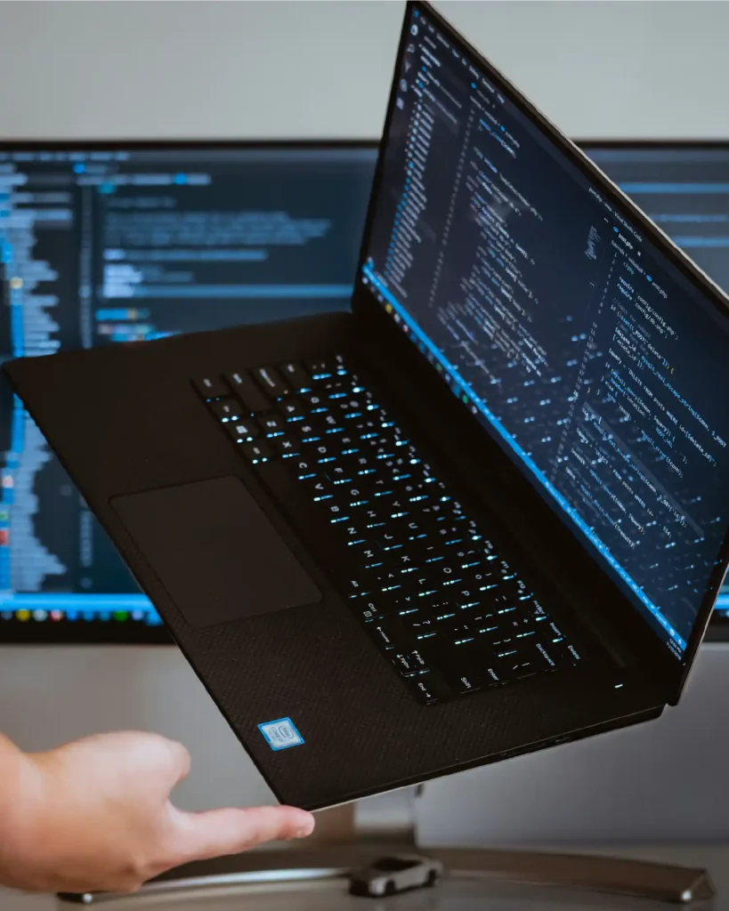 laptop on the tip of the finger