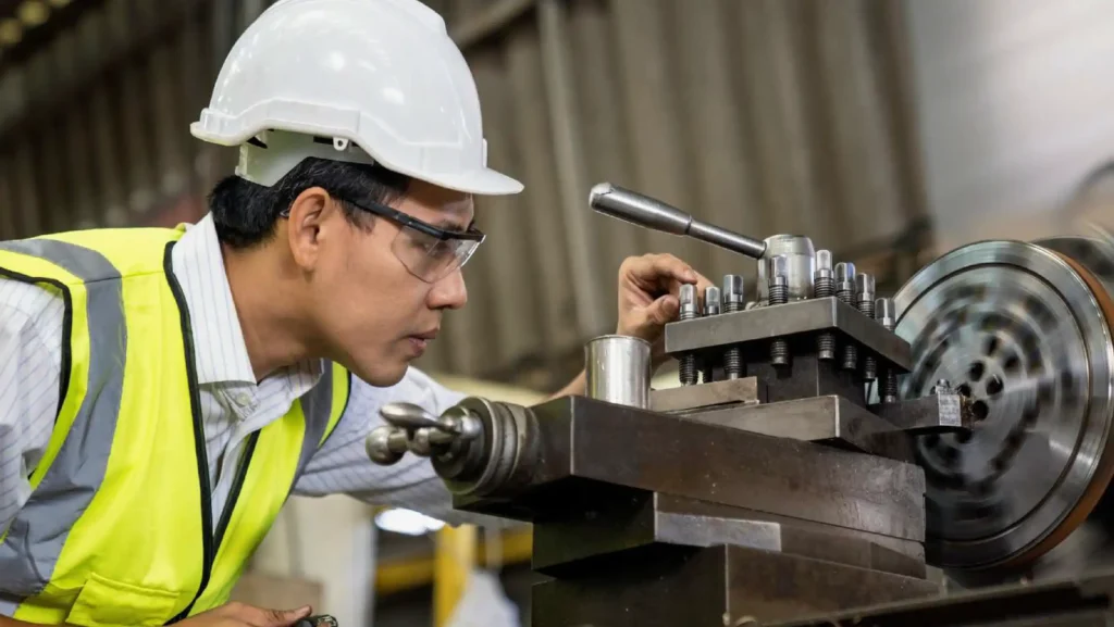 mechanical-engineer looking at the machine